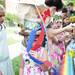Ypsilanti resident Tamsin Aherne, 5, puts on her hat creation at the Community Day Care and preschool booth during the Townie Street Party on Monday, July 15. Daniel Brenner I AnnArbor.com